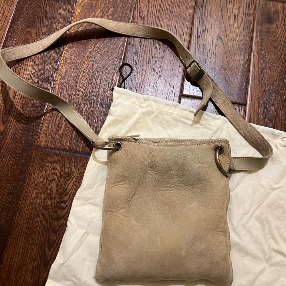 UGG cross body purse! Sand outside color with fur inside